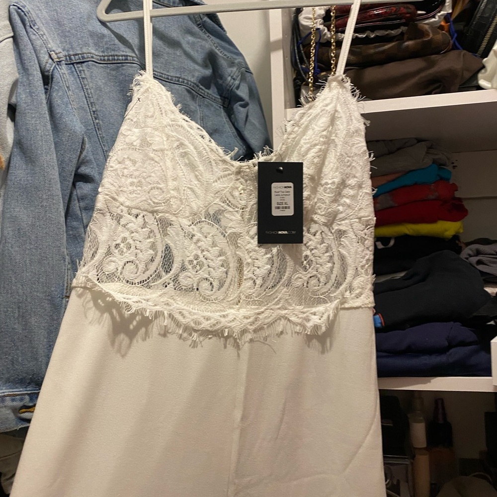 NWT Fashion Nova Roof Top Date White Jumpsuit with Lace. SOLD OUT ON SITE